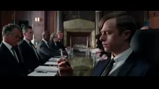 man in suit at long formal table — The Amazing Spider Man 2