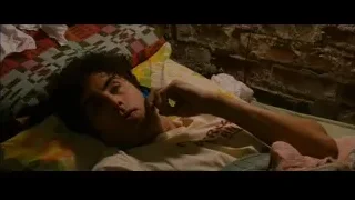 young man lying in bed deep in thought — The Dictator