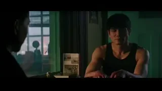 young man deep in thought by window — Bruce Lee: Birth of The Dragon
