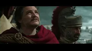 two men in armor under cloudy sky — Gladiator 2