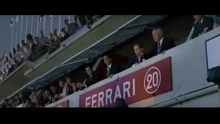 Men on Ferrari dealership balcony — Ford v Ferrari