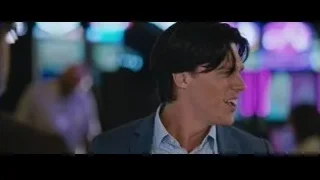 two men conversing and smiling — The Big Short
