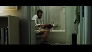 Young man reading on toilet in bathroom — Fight Club