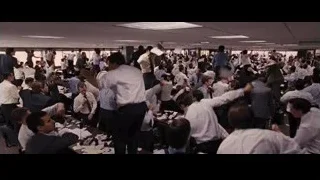 group cheering and throwing papers in office — The Wolf Of Wall Street