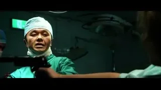 two surgeons in operating room — Lucy