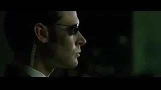 Man in black jacket in dark room — The Matrix