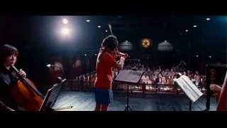 young girl playing violin with orchestra — The Karate Kid