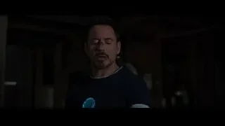 Man with beard in dimly lit room — Iron Man 3
