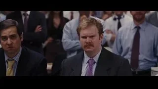 two men in suits conversing in conference room — The Wolf Of Wall Street