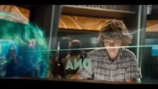 People looking at large screen display — Jurassic World