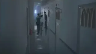 police officers walking in narrow corridor — Weathering with You