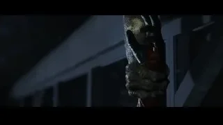 Hand holding metal object — The Amazing Spider Man