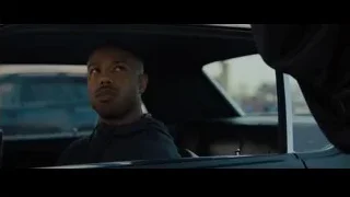 man in car deep in thought — Creed 2