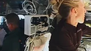 Man and woman standing in cockpit — Elon Musk: Return to Space