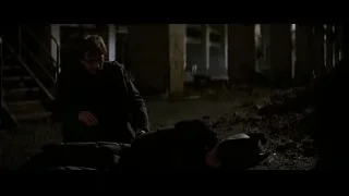 Man kneeling by Batman in abandoned building — Batman: The Dark Knight