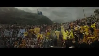 Large crowd gathered on hillside with flags — Harry Potter and the Goblet of Fire