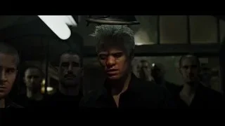 blonde man speaking to group of men — Fight Club