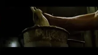 hand holding metal strainer — Fight Club