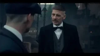 two men in suits in dimly lit room — Peaky Blinders