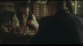 two men at desk in dimly lit room — Peaky Blinders