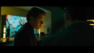two men in dim room with map screen — John Wick: Chapter 4