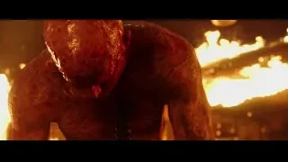 distressed man covered in blood — Deadpool
