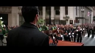 man speaking at podium to crowd — Batman: The Dark Knight