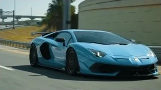 blue sports car driving on highway — Sports Cars