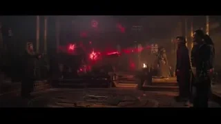 people in dimly lit room with fire tree — Doctor Strange 2