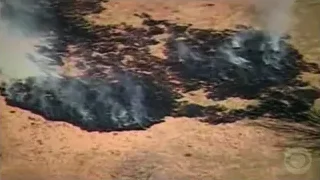 Smoking crater in desert landscape — Elon Musk: Return to Space