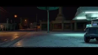 two vintage cars parked on street at night — Cars