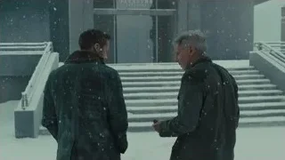 Two men conversing on snowy stairs — Blade Runner 2049