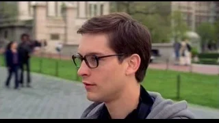 young man with glasses in park — Spider Man