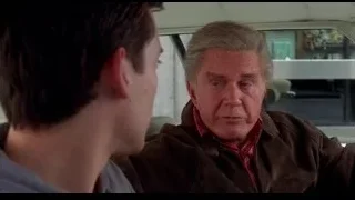 Two men talking in car — Spider Man