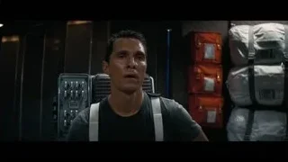 Man with backpack in room with luggage — Interstellar