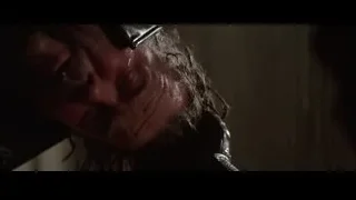 man's wet face in dark room — Batman