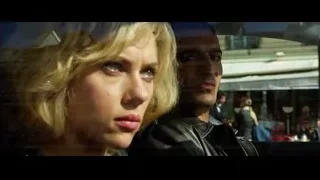 man and woman in car — Lucy