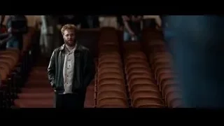 man in empty auditorium — Steve Jobs