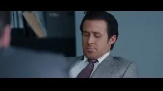 man in suit sitting in office — The Big Short