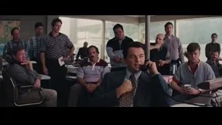 man in office talking on phone — The Wolf Of Wall Street