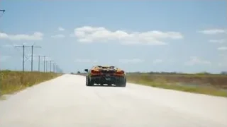 Sports car driving on a road — Sports Cars