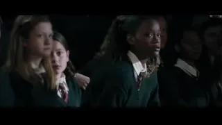 Girls in school uniforms standing in line — Harry Potter and the Goblet of Fire