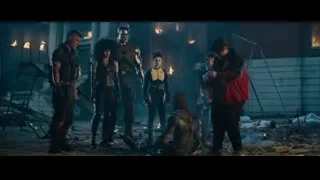 Group in destroyed building at night — Deadpool 2