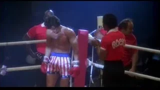man clenching fists in boxing ring — Rocky III