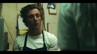 Young man in kitchen deep in thought — The Bear