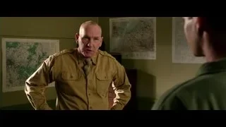 man in military uniform in room with maps — Hacksaw Ridge