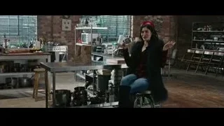 Woman in red beanie in kitchen — Now You See Me 2