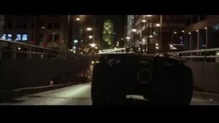 Person in futuristic helmet with vehicle — Batman