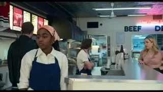 people at restaurant kitchen counter — The Bear