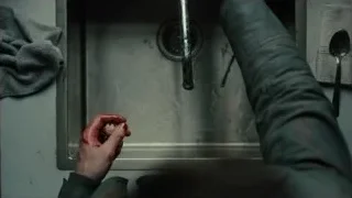 Bloody hands holding scissors in dirty sink — Blade Runner 2049